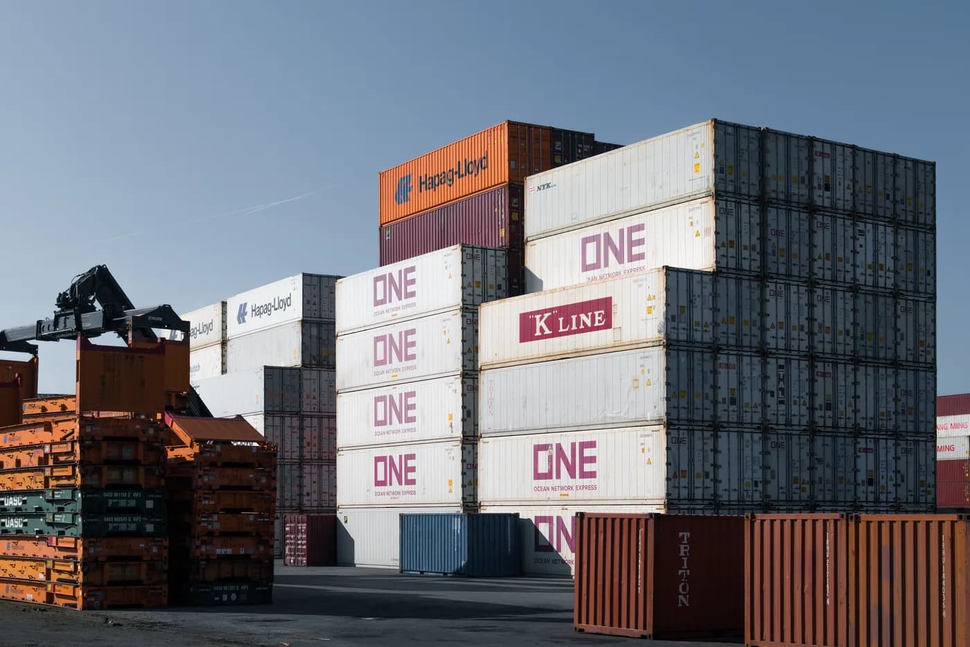 Shipping containers stacked at a port terminal